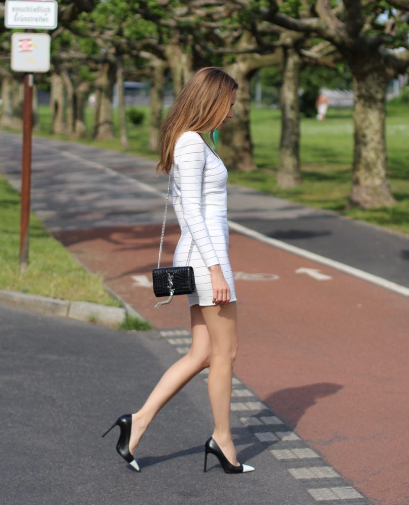 Alexandra Lapp wearing a white dress from Balmain, Saint Laurent, Topshop