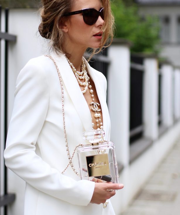 Alexandra Lapp wearing white pearls from Chanel, Levi's, Sophia Webster, Pearl and Rubies