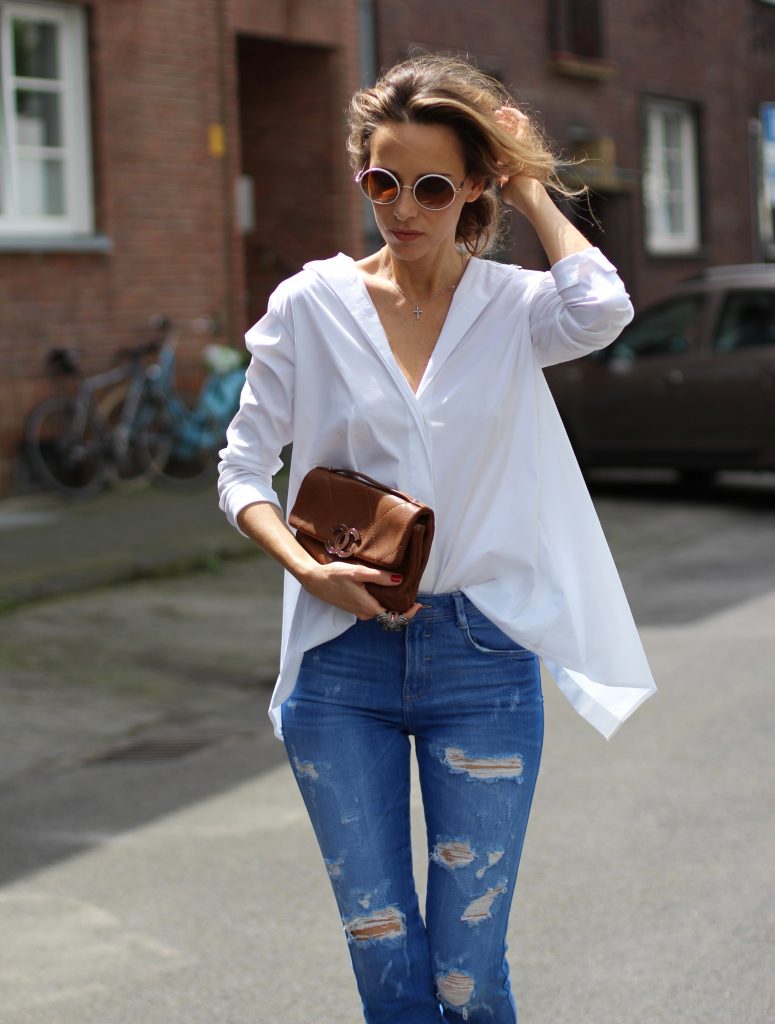 Alexandra Lapp wearing a white shirt from Steffen Schraut, Zara, Christian Louboutin, Chanel, Chanel vintage, BCBG, Chrome Hearts