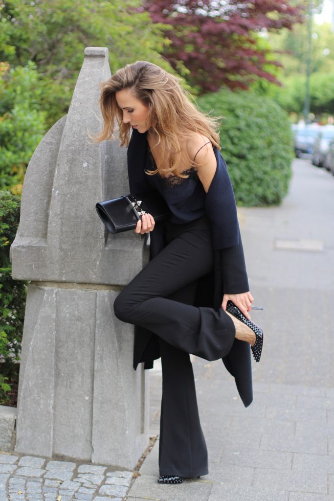 Alexandra Lapp wearing all black, Steffen Schraut, Filippa K., Hermès, Christian Louboutin, IWC