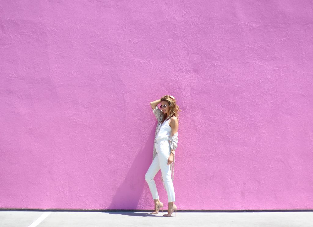 Alexandra Lapp wearing SET, Levi's, Christian Louboutin, Chanel, Chrome Hearts in front of Walls of Los Angeles.