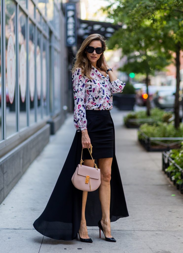 NEW YORK, NY - SEPTEMBER 14: German Fashion Blogger and Model Alexandra Lapp (@alexandralapp_) wearing a black Tigha skirt, Jadicted blouse, Chloe bag, Celine sunglasses and Christian Louboutin pumps on September 14, 2016 in New York City. (Photo by Christian Vierig/Getty Images) *** Local Caption *** Alexandra Lapp
