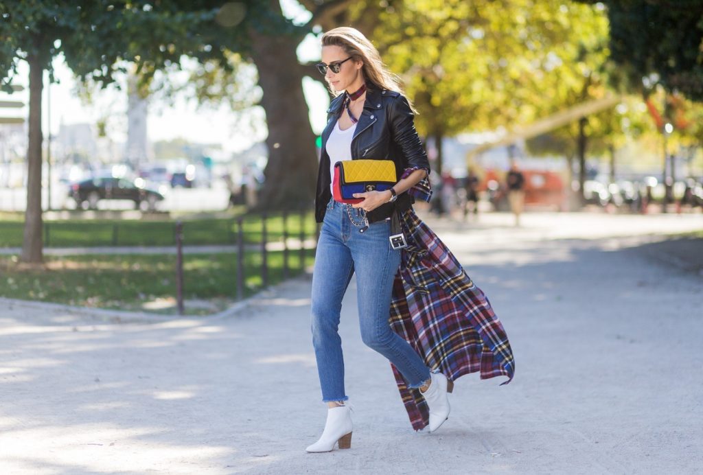 PARIS, FRANCE - OCTOBER 03: German fashion blogger and model Alexandra Lapp (@alexandralapp_) wearing layer love, Levis denim jeans, a white James Perse tshirt, L'Agence plaid dress, white Zara shoes, Ray Ban sunglasses, Schott NYC leather jacket, Chanel bag on October 3, 2016 in Paris, France. (Photo by Christian Vierig/Getty Images) *** Local Caption *** Alexandra Lapp