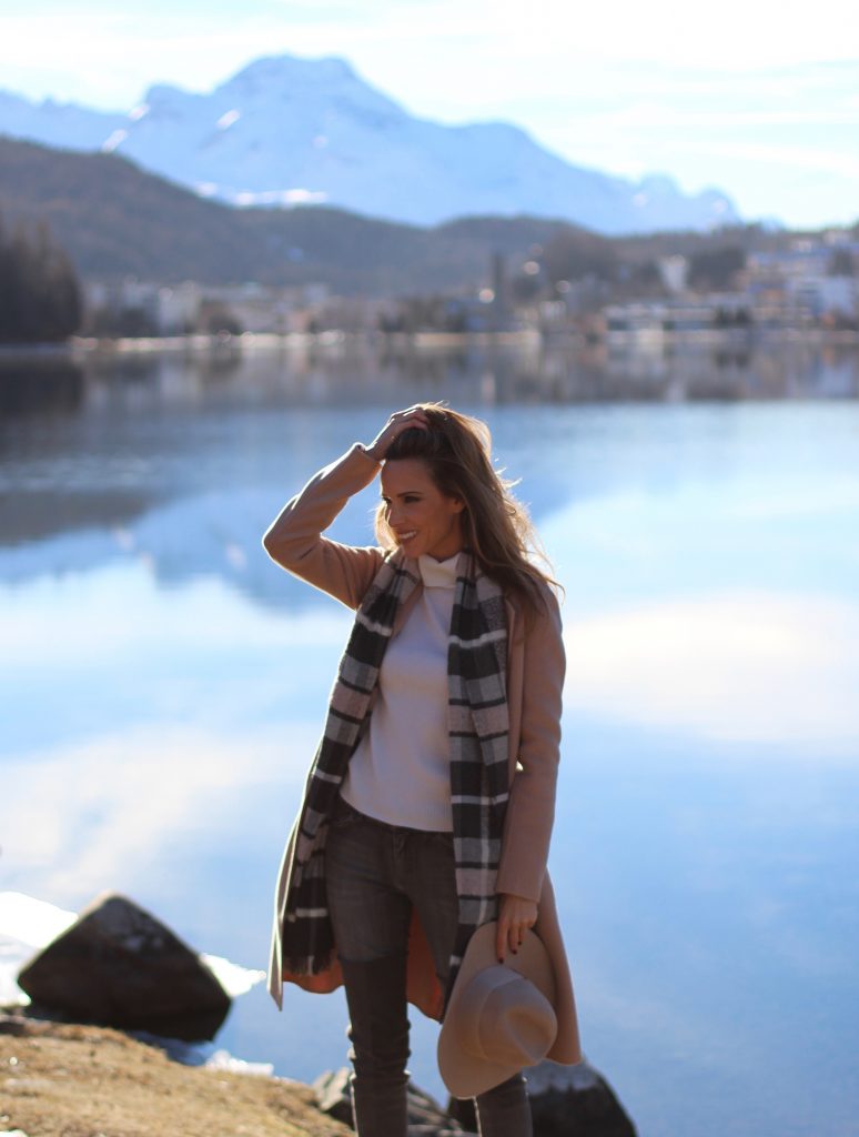 SANKT MORITZ - DEZEMBER : German model and fashion blogger Alexandra Lapp (@alexandralapp_) wearing Marc Cain in St. Moritz, an off white turtleneck, grey slim jeans, a beige cashmere coat, scarf and hat by Marc Cain, overknee boots in grey from Gianvito Rossi, IWC watch and a bag by Chloe on Dezember, 2016 in Sankt Moritz *** Local Caption *** Alexandra Lapp