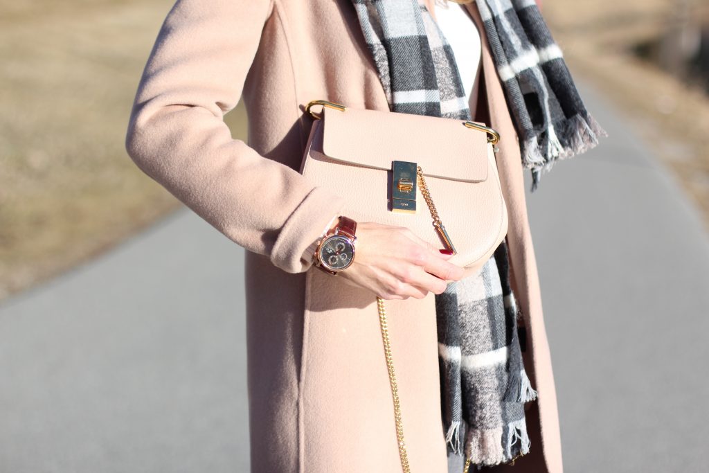 SANKT MORITZ - DEZEMBER : German model and fashion blogger Alexandra Lapp (@alexandralapp_) wearing Marc Cain in St. Moritz, an off white turtleneck, grey slim jeans, a beige cashmere coat, scarf and hat by Marc Cain, overknee boots in grey from Gianvito Rossi, IWC watch and a bag by Chloe on Dezember, 2016 in Sankt Moritz *** Local Caption *** Alexandra Lapp