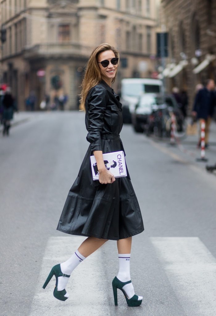 FLORENCE, ITALY - JANUARY 11: German fashion blogger and model Alexandra Lapp, wearing a leather shirt dress from Set Fashion, white tennis socks with printed Mother Fucker, dark green plateau sandals from Prada, Matte black 'Dior So Real' sunglasses from Dior Eyewear and a handmade book clutch from MD Clutch on January 11, 2017 in Florence, Italy. (Photo by Christian Vierig/Getty Images) *** Local Caption *** Alexandra Lapp