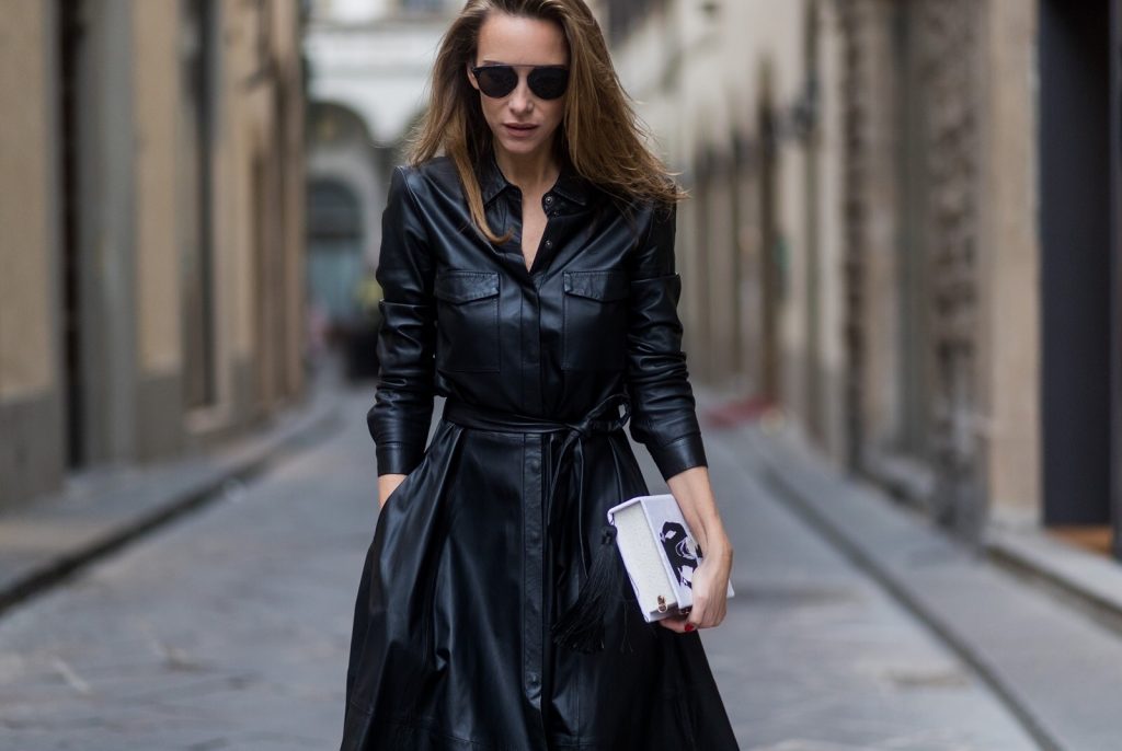 FLORENCE, ITALY - JANUARY 11: German fashion blogger and model Alexandra Lapp, wearing a leather shirt dress from Set Fashion, white tennis socks with printed Mother Fucker, dark green plateau sandals from Prada, Matte black 'Dior So Real' sunglasses from Dior Eyewear and a handmade book clutch from MD Clutch on January 11, 2017 in Florence, Italy. (Photo by Christian Vierig/Getty Images) *** Local Caption *** Alexandra Lapp