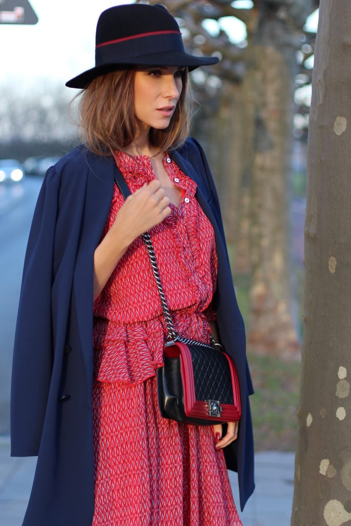 DÜSSELDORF, GERMANY - FEBRUARY 19: German fashion blogger and model Alexandra Lapp is wearing a flounce dress in red from Steffen Schraut, a midnight blue blazer by Steffen Schraut, Maison Michel Virginie rabbit-felt fedora hat in black with a grosgrain ribbon in dark blue with red, that is adorned with the label's logo in the form of a glossy black charm, a boy bag in black and red calfskin and vintage biker boots by Gucci on February 19, 2017 Düsseldorf, Germany. *** Local Caption *** Alexandra Lapp