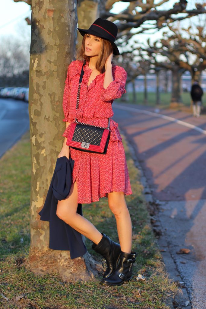 DÜSSELDORF, GERMANY - FEBRUARY 19: German fashion blogger and model Alexandra Lapp is wearing a flounce dress in red from Steffen Schraut, a midnight blue blazer by Steffen Schraut, Maison Michel Virginie rabbit-felt fedora hat in black with a grosgrain ribbon in dark blue with red, that is adorned with the label's logo in the form of a glossy black charm, a boy bag in black and red calfskin and vintage biker boots by Gucci on February 19, 2017 Düsseldorf, Germany. *** Local Caption *** Alexandra Lapp