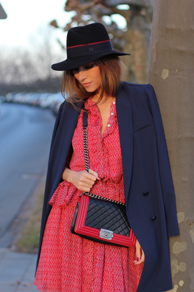 DÜSSELDORF, GERMANY - FEBRUARY 19: German fashion blogger and model Alexandra Lapp is wearing a flounce dress in red from Steffen Schraut, a midnight blue blazer by Steffen Schraut, Maison Michel Virginie rabbit-felt fedora hat in black with a grosgrain ribbon in dark blue with red, that is adorned with the label's logo in the form of a glossy black charm, a boy bag in black and red calfskin and vintage biker boots by Gucci on February 19, 2017 Düsseldorf, Germany. *** Local Caption *** Alexandra Lapp