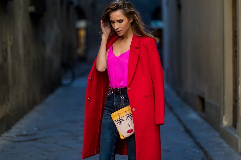 FLORENCE, ITALY - JANUARY 11: German fashion blogger and model Alexandra Lapp is wearing red blazer coat from Oui Fashion, pink silk top from Jadicted, high waist jeans/denim from Rag & Bone, red metallic pumps from Gianvito Rossi, Prada clutch, leather belt from SET on January 11, 2017 in Florence, Italy. (Photo by Christian Vierig/Getty Images) *** Local Caption *** Alexandra Lapp