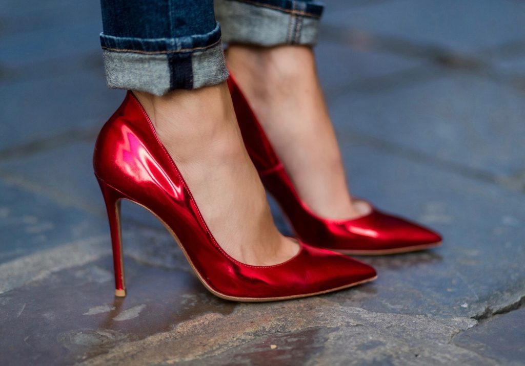 FLORENCE, ITALY - JANUARY 11: German fashion blogger and model Alexandra Lapp is wearing red blazer coat from Oui Fashion, pink silk top from Jadicted, high waist jeans/denim from Rag & Bone, red metallic pumps from Gianvito Rossi, Prada clutch, leather belt from SET on January 11, 2017 in Florence, Italy. (Photo by Christian Vierig/Getty Images) *** Local Caption *** Alexandra Lapp