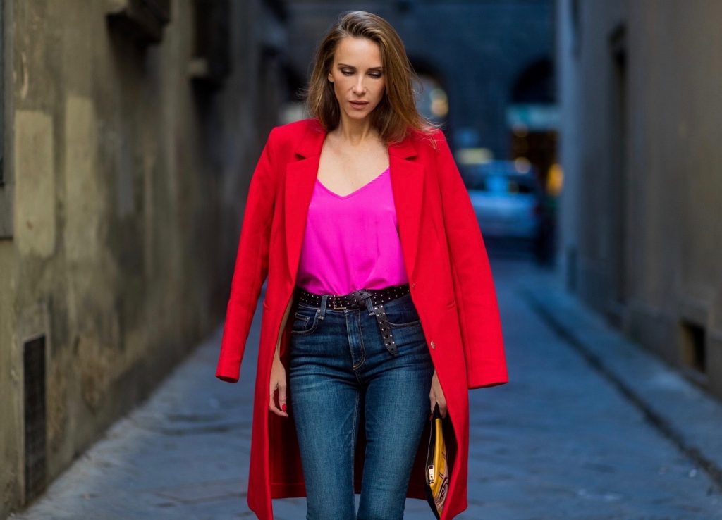 FLORENCE, ITALY - JANUARY 11: German fashion blogger and model Alexandra Lapp is wearing red blazer coat from Oui Fashion, pink silk top from Jadicted, high waist jeans/denim from Rag & Bone, red metallic pumps from Gianvito Rossi, Prada clutch, leather belt from SET on January 11, 2017 in Florence, Italy. (Photo by Christian Vierig/Getty Images) *** Local Caption *** Alexandra Lapp