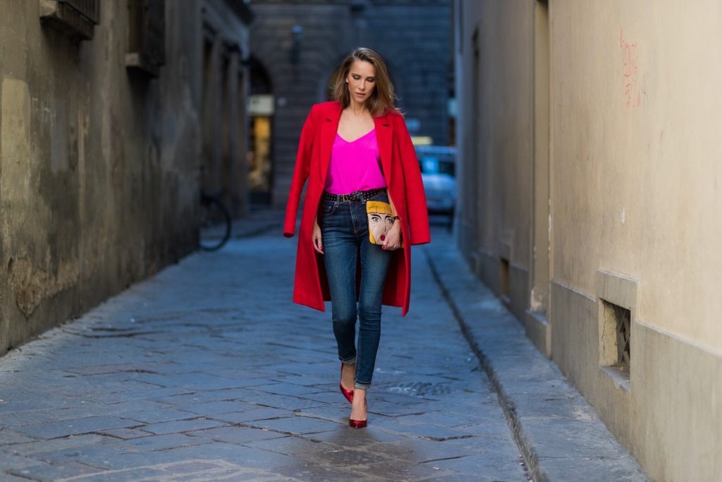 FLORENCE, ITALY - JANUARY 11: German fashion blogger and model Alexandra Lapp is wearing red blazer coat from Oui Fashion, pink silk top from Jadicted, high waist jeans/denim from Rag & Bone, red metallic pumps from Gianvito Rossi, Prada clutch, leather belt from SET on January 11, 2017 in Florence, Italy. (Photo by Christian Vierig/Getty Images) *** Local Caption *** Alexandra Lapp