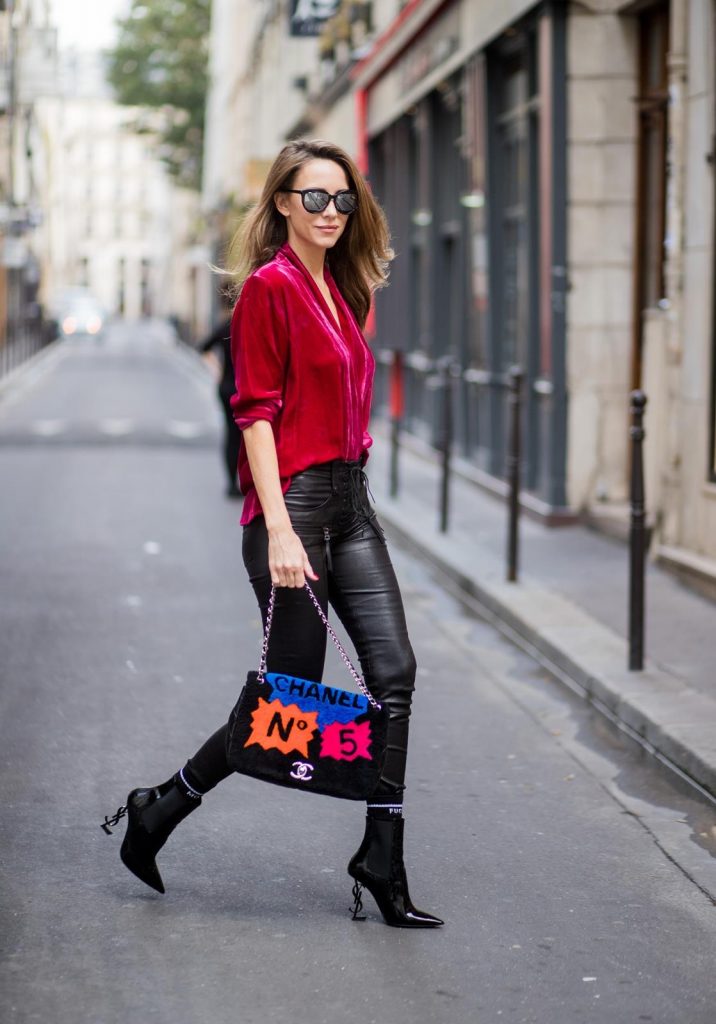 Alexandra Lapp having a velvet crush, wearing a velvet blazer from Jadicted in burgundy red, leather pants in black with laced high waist and ankle zippers from Unravel, Chanel lambskin bag printed with Chanel No.5 from the supermarket collection by Chanel, Diormania sunglasses by Dior, Opyum 110 lacquer ankle boots from Saint Laurent, and mother fucker socks from Mother Denim is seen during Paris Fashion Week Spring/Summer 2018 on September 29, 2017 in Paris, France.