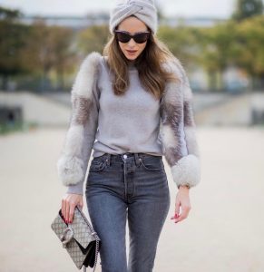 Alexandra Lapp wearing turban style in Paris, a cashmere turban from Falconeri, cashmere turtleneck pullover with fur sleeves from Falconeri, Levis 501 Skinny Fit jeans in black, sunglasses with pearls from Chanel, beige suede ankle boots by Gianvito Rossi and Dionysus GG Supreme shoulder bag from Gucci is seen during Paris Fashion Week Spring/Summer 2018 on September 29, 2017 in Paris, France.
