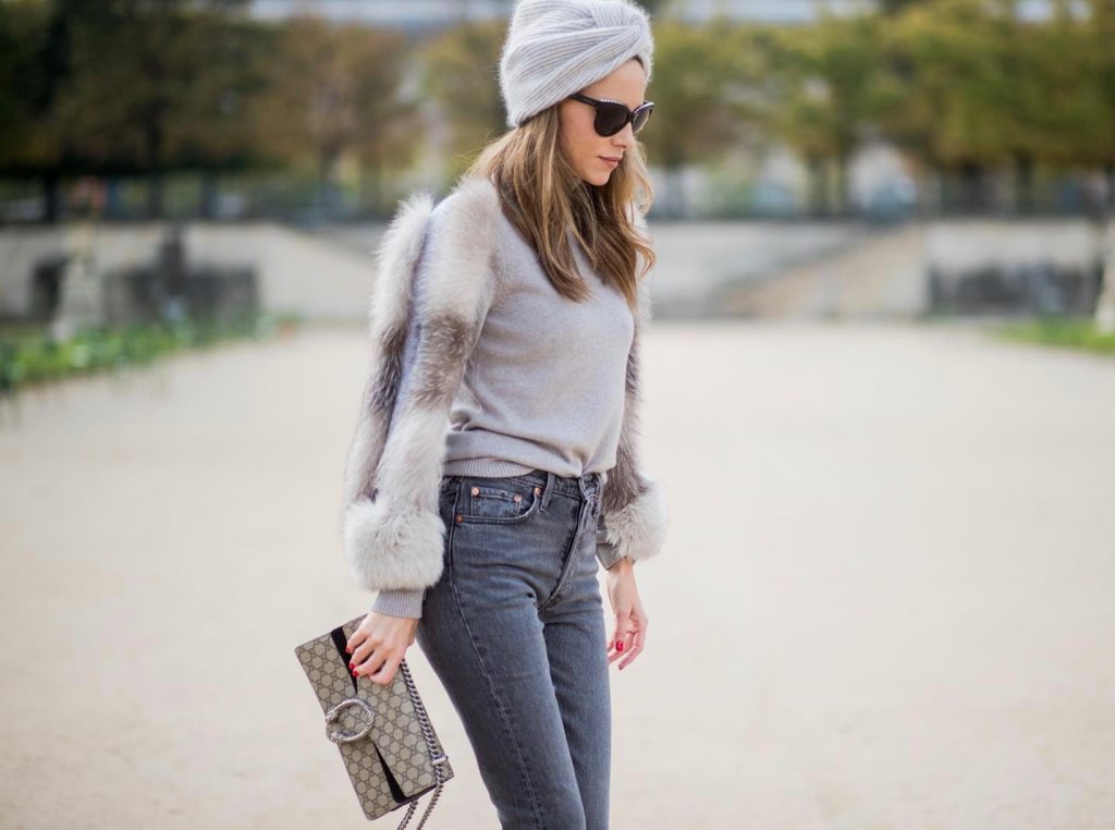 Alexandra Lapp wearing turban style in Paris, a cashmere turban from Falconeri, cashmere turtleneck pullover with fur sleeves from Falconeri, Levis 501 Skinny Fit jeans in black, sunglasses with pearls from Chanel, beige suede ankle boots by Gianvito Rossi and Dionysus GG Supreme shoulder bag from Gucci is seen during Paris Fashion Week Spring/Summer 2018 on September 29, 2017 in Paris, France.