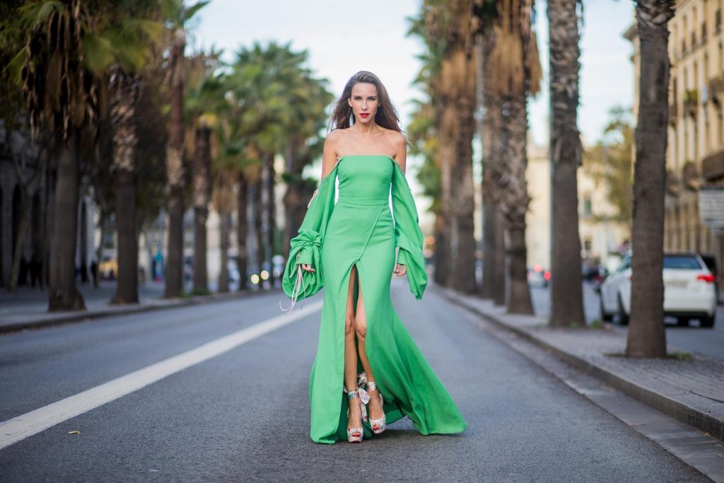 BARCELONA, SPAIN - NOVEMBER 27: Hawaiin vibes in Barcelona, Alexandra Lapp wearing a green long dress from Lana Mueller and Christian Louboutin multicolor heels on November 27, 2017 in Barcelona, Spain. 