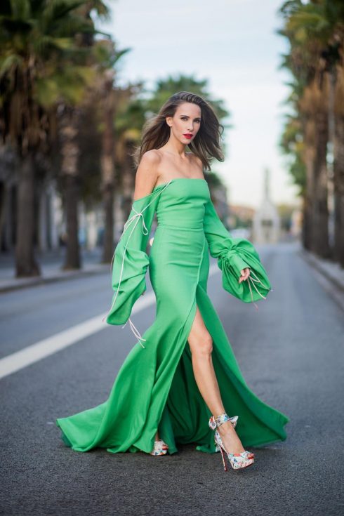 BARCELONA, SPAIN - NOVEMBER 27: Hawaiin vibes in Barcelona, Alexandra Lapp wearing a green long dress from Lana Mueller and Christian Louboutin multicolor heels on November 27, 2017 in Barcelona, Spain.