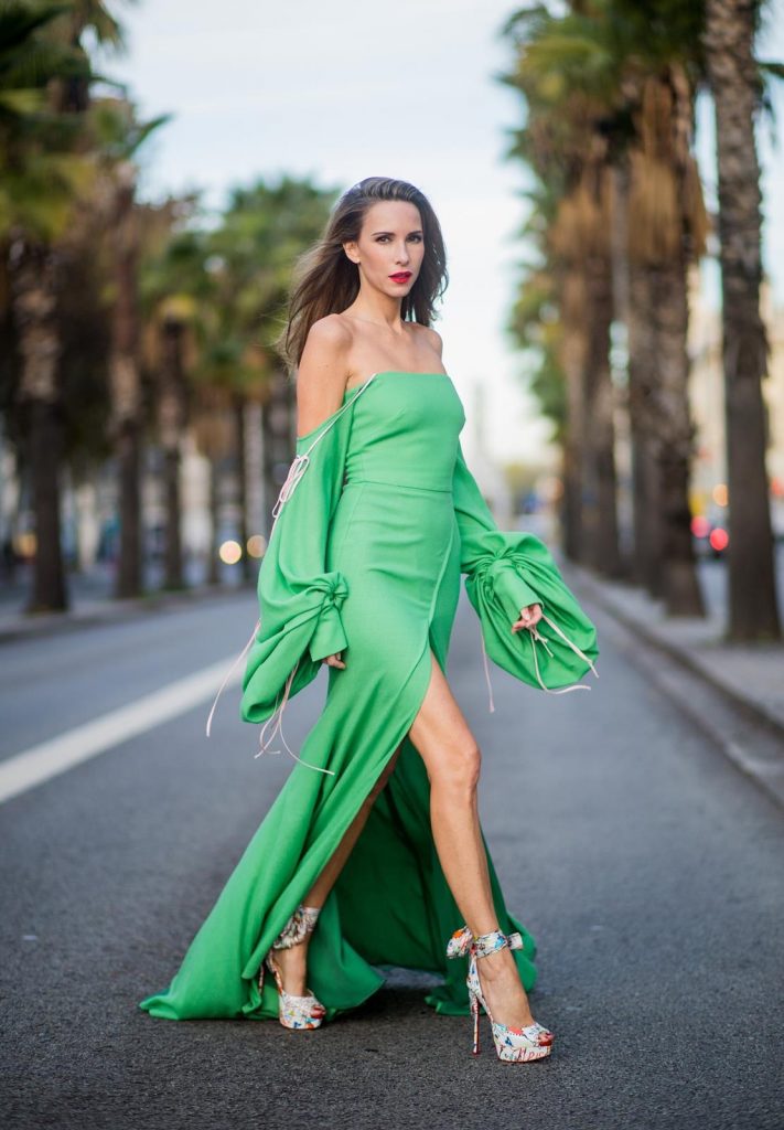 BARCELONA, SPAIN - NOVEMBER 27: Hawaiin vibes in Barcelona, Alexandra Lapp wearing a green long dress from Lana Mueller and Christian Louboutin multicolor heels on November 27, 2017 in Barcelona, Spain. 