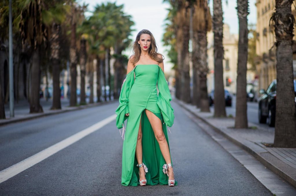 BARCELONA, SPAIN - NOVEMBER 27: Hawaiin vibes in Barcelona, Alexandra Lapp wearing a green long dress from Lana Mueller and Christian Louboutin multicolor heels on November 27, 2017 in Barcelona, Spain. 