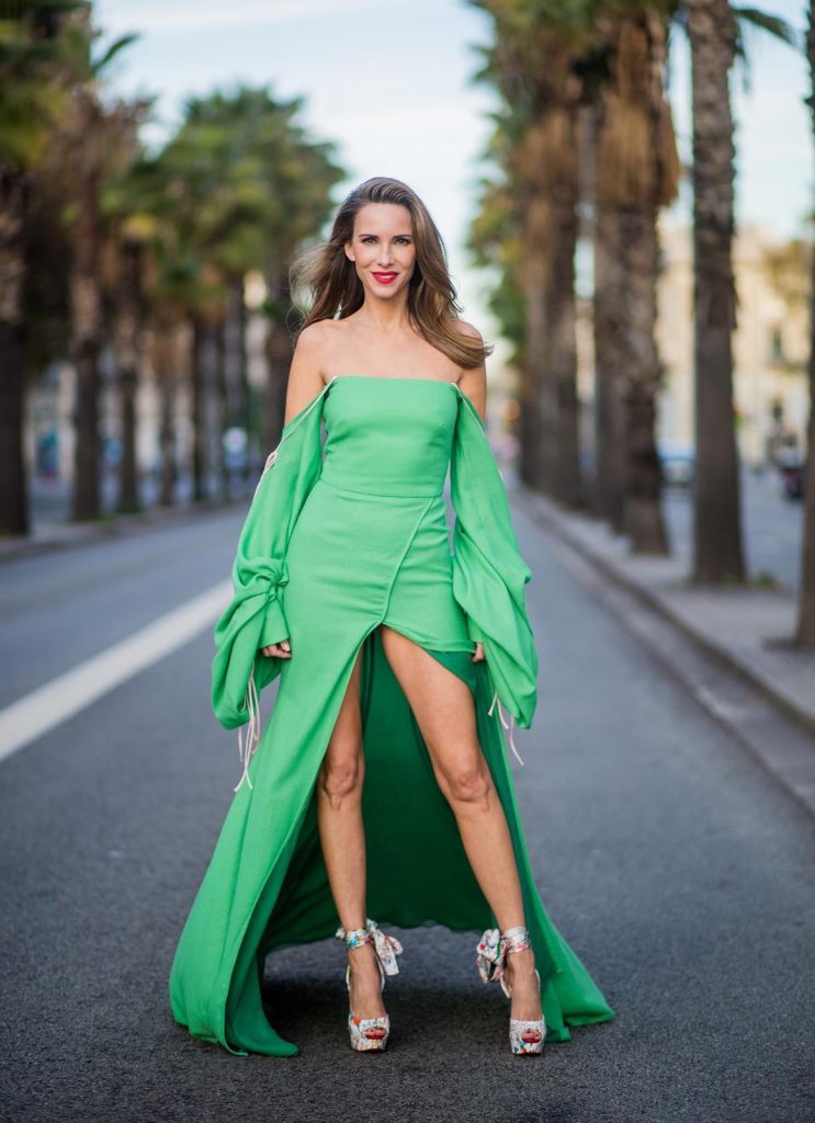 BARCELONA, SPAIN - NOVEMBER 27: Hawaiin vibes in Barcelona, Alexandra Lapp wearing a green long dress from Lana Mueller and Christian Louboutin multicolor heels on November 27, 2017 in Barcelona, Spain. 