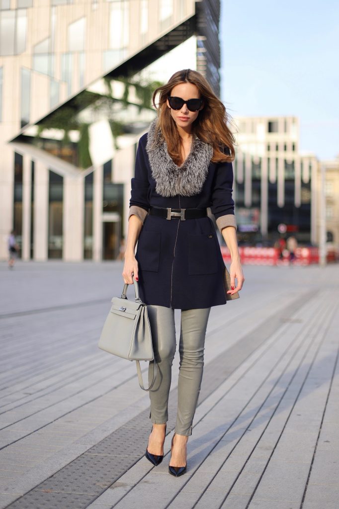 Model and Blogger Alexandra Lapp in a Long Cardigan Look wearing a long cardigan coat by Airfield, grey leather pants from Jbrand, black So Kate Heels from Christian Louboutin, grey Kelly bag by Hermès, vintage Buckle belt from Hermès and black Audrey sunglasses by Céline.
