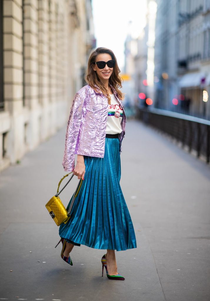 Alexandra Lapp in a Metallic Fashion look, wearing the crinkled Alby laminated jacket from Sies Marjan, a pleated metallic skirt from ROQA in turquoise, a white logo print Gucci t-shirt, Chanel Boy bag in gold, Audrey sunglasses from Celine during Paris Fashion Week Womenswear Fall/Winter 2019/2020 on February 25, 2019 in Paris, France. (Photo by Christian Vierig/Getty Images)