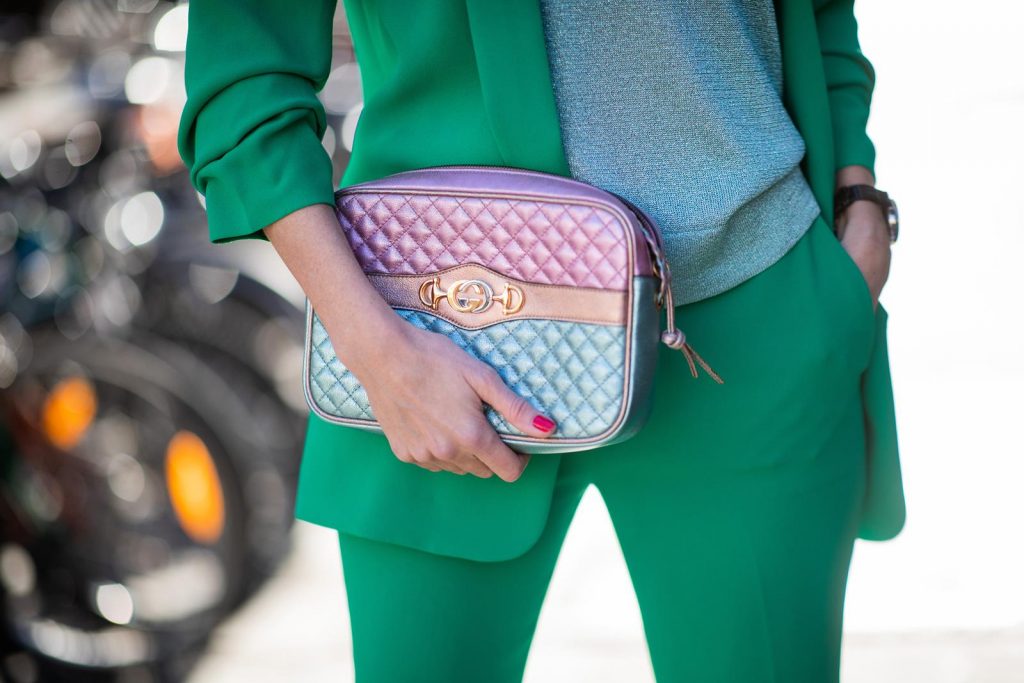 Alexandra Lapp in a Green Suit look wearing a green suit combination by Steffen Schraut with a long blazer with a 3/4 length sleeve blazer and matching 7/8 length pants, Missoni tank top, Gucci Trapuntata bag in turquoise/pink/gold, So Kate Suede Stripyglitter - Version Multi pumps from Christian Louboutin during Paris Fashion Week Womenswear Fall/Winter 2019/2020 on February 26, 2019 in Paris, France. (Photo by Christian Vierig/Getty Images)