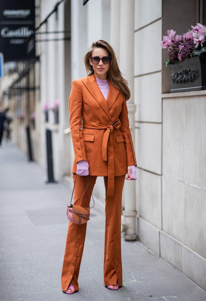 PARIS, FRANCE - FEBRUARY 25: Alexandra Lapp is seen wearing a suit style, Altuzarra suit, Rejina Pyo Net Sustain Candice ribbed jersey top, Loewe Gate mini shoulder bag in brown and Fendi sunglasses all from Net-A-Porter during Paris Fashion Week - Womenswear Fall/Winter 2020/2021 : Day Two on February 25, 2020 in Paris, France. 