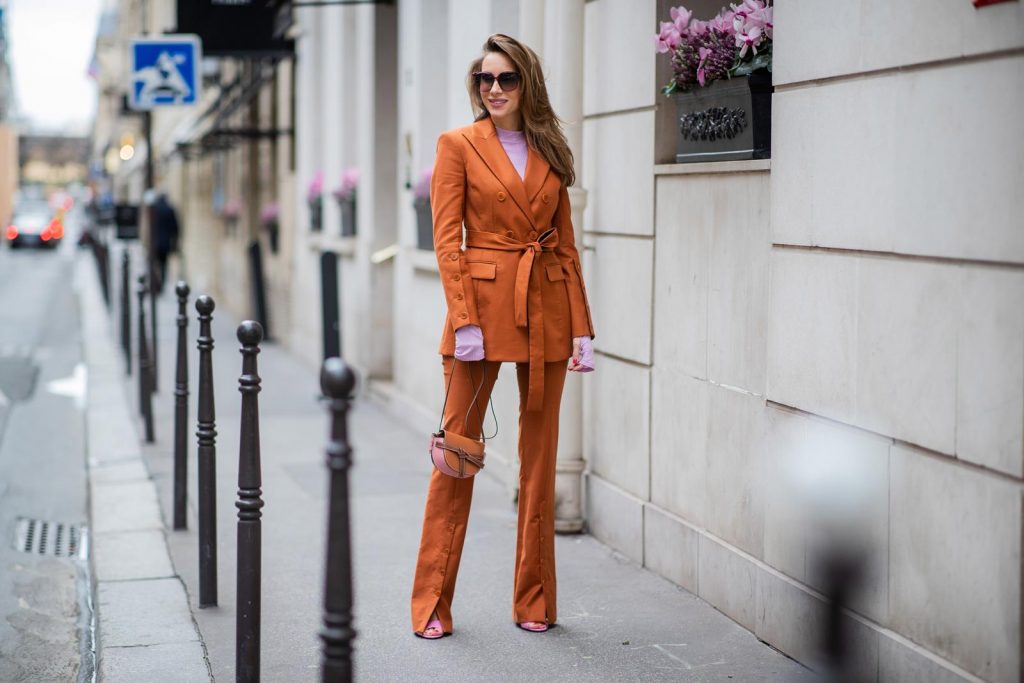 PARIS, FRANCE - FEBRUARY 25: Alexandra Lapp is seen wearing a suit style, Altuzarra suit, Rejina Pyo Net Sustain Candice ribbed jersey top, Loewe Gate mini shoulder bag in brown and Fendi sunglasses all from Net-A-Porter during Paris Fashion Week - Womenswear Fall/Winter 2020/2021 : Day Two on February 25, 2020 in Paris, France. 