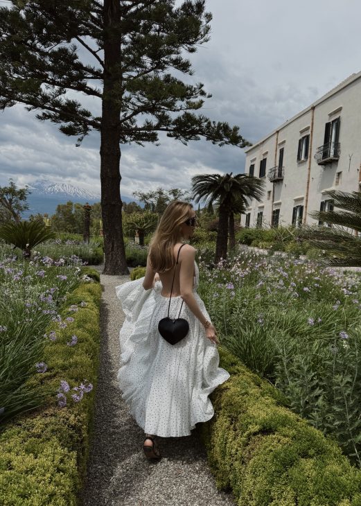 Alexandra Lapp, Four Seasons Taormina, San Domenico Palace, Sicily holidays, luxury travel Sicily, Taormina Italy, luxury hotel Sicily, Italian summer, luxury vacation, fashion influencer travel, Mediterranean lifestyle, Sicilian getaway, Four Seasons Sicily, luxury resort Italy, Taormina holidays, Seidensticker x Alexandra Lapp, Hermès, Kelly Bag, Christian Dior, Saint Laurent, Seidensticker Alexandra Lapp enjoying a luxury holiday at San Domenico Palace, Taormina, A Four Seasons Hotel in Sicily, Italy. The fashion and lifestyle influencer experiences the beauty of the iconic Four Seasons resort overlooking the Ionian Sea and the historic town of Taormina. Elegant resort style, Mediterranean charm, and luxury travel inspiration capture the essence of a perfect Sicilian getaway.